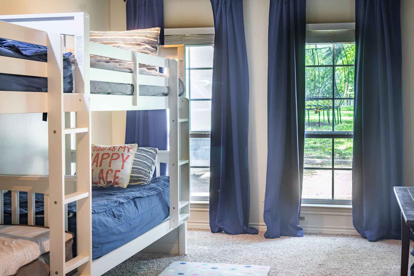 The bunk room — four bunks, one happy place